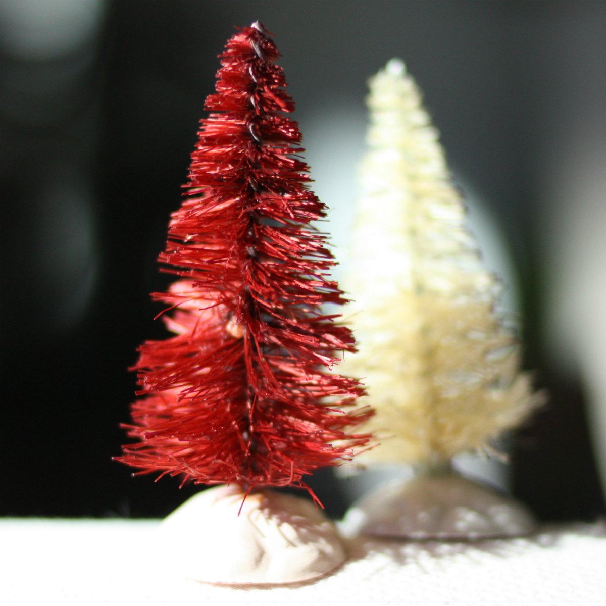 Red and white dyed bottle brush trees for Christmas