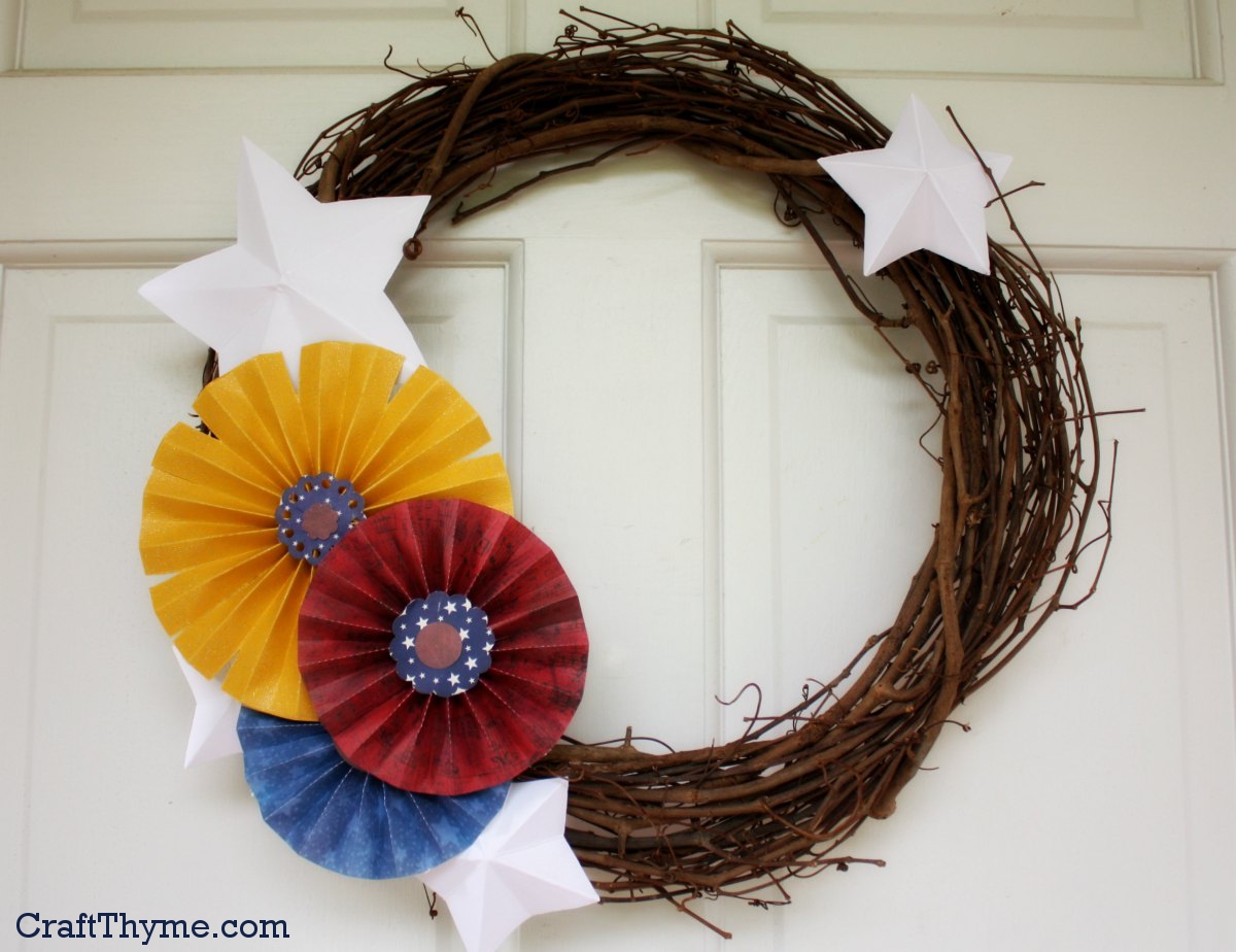 4th of July wreath made with paper medallions and stars